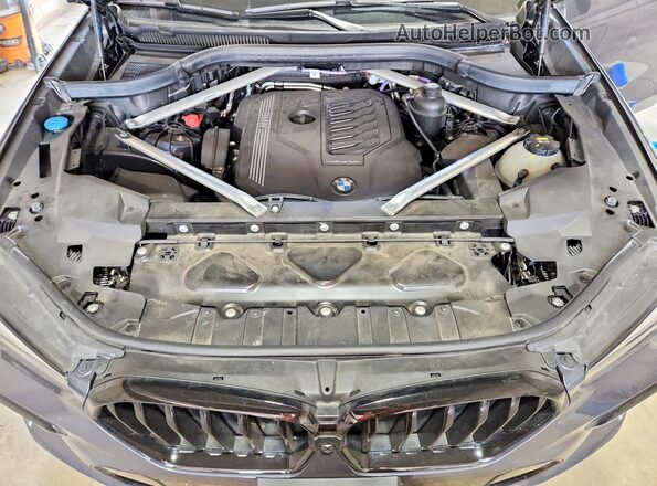5UXCY6C06M9F13907 2021 BMW X6 Black Engine compartment view