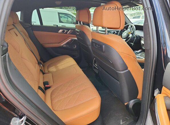 5UXCY8C02P9N57142 2023 BMW X6 Black Սալոնի հետևի տեսք