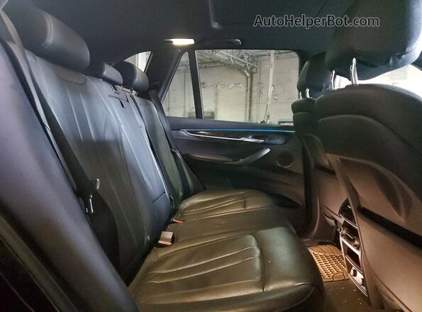 5UXKR0C50JL072885 2018 BMW X5 Charcoal Vista interior trasera