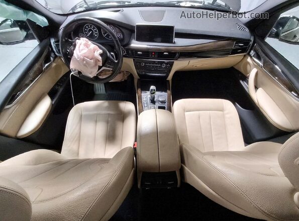 5UXKR0C54J0Y04789 2018 BMW X5 Gold Vista del salpicadero
