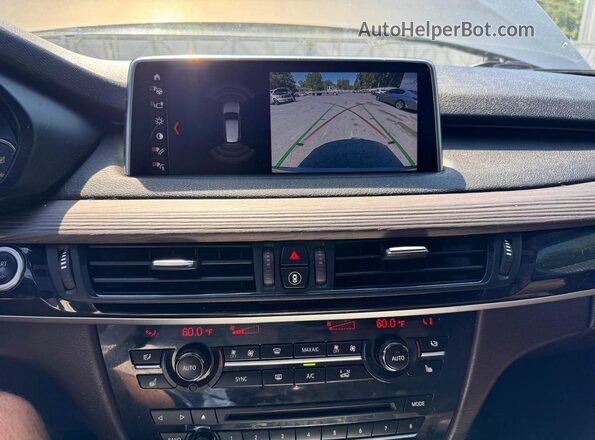 5UXKR6C58J0U15446 2018 BMW X5 Brown Vista de los asientos traseros