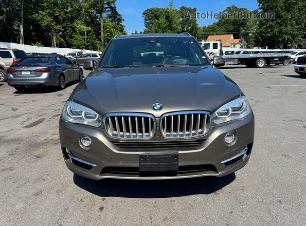 5UXKR6C58J0U15446 2018 BMW X5 Brown Vista trasera