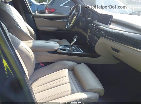 5UXKT0C37H0V95851 2017 BMW X5 Blue Front interior view