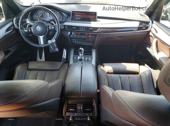 5UXKT0C56J0W00612 2018 BMW X5 Серебряный Вид панели приборов