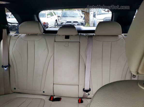 5UXKT0C58J0V99396 2018 BMW X5 Черный Вид задних сидений