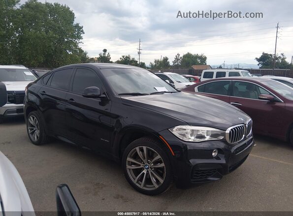 5UXKU6C5XG0R33937 2016 BMW X6 Black Vista interior trasera