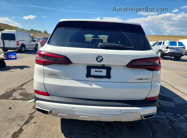 5UXTA6C04M9G68363 2021 BMW X5 White Vista del compartimento del motor
