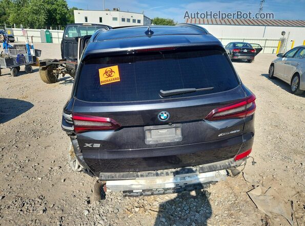 5UXTA6C08P9P28324 2023 BMW X5 Black Հետևի տեսք
