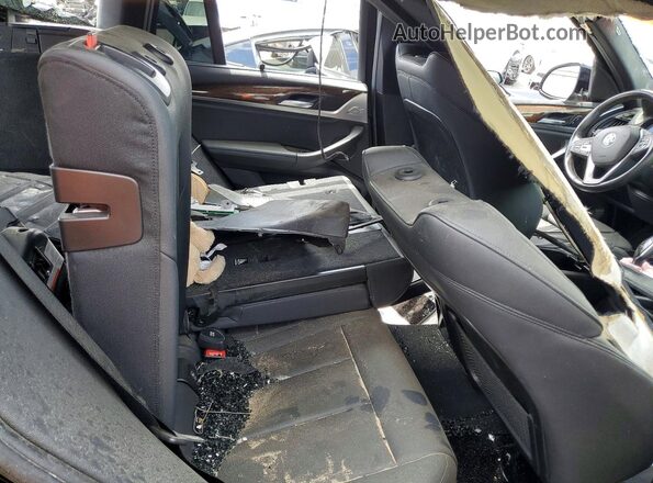 5UXTR7C52KLR45275 2019 BMW X3 Black Vista interior trasera