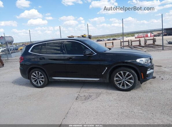 5UXTR7C54KLE97317 2019 BMW X3 Черный Вид задней части салона