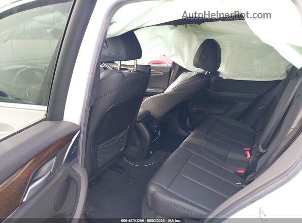 5UXTR7C54KLR50543 2019 BMW X3 White Vista de la etiqueta del VIN