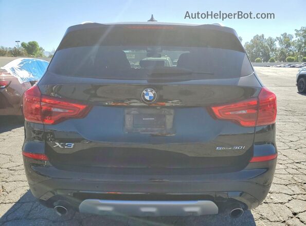 5UXTR7C5XKLR49669 2019 BMW X3 Черный Вид сзади