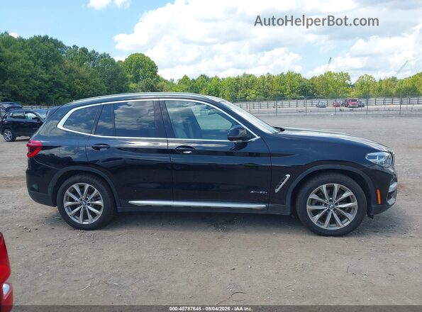 5UXTR9C52JLD62282 2018 BMW X3 Black Widok wnętrza z tyłu