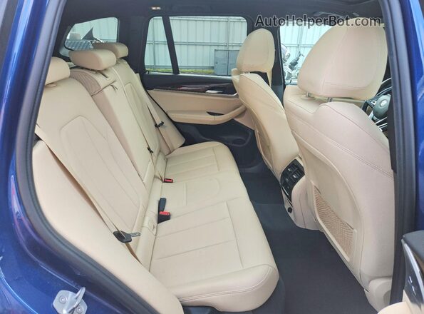 5UXTR9C53KLR09610 2019 BMW X3 Blue Vista interior trasera
