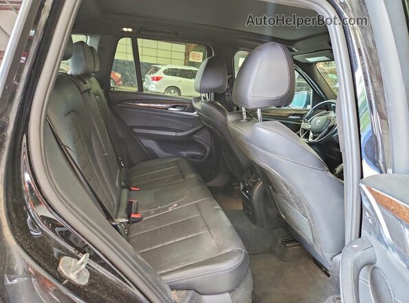 5UXTR9C56JLD61233 2018 BMW X3 Black Vista interior trasera