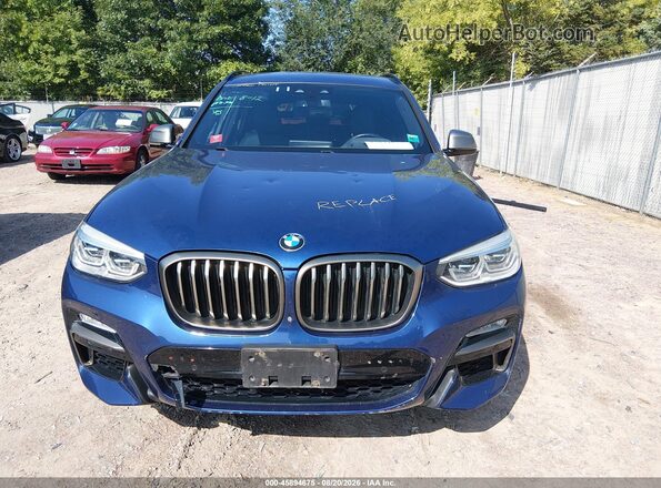 5UXTS3C50J0Z00543 2018 BMW X3 Blue Rear interior view