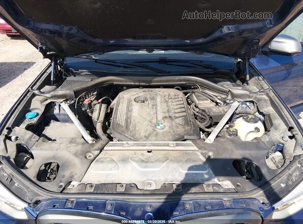 5UXTS3C50J0Z00543 2018 BMW X3 Blue Rear view