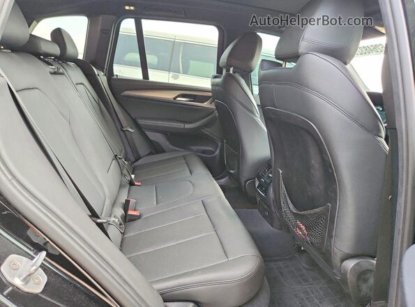 5UXTS3C5XK0Z04858 2019 BMW X3 Black Vista interior trasera