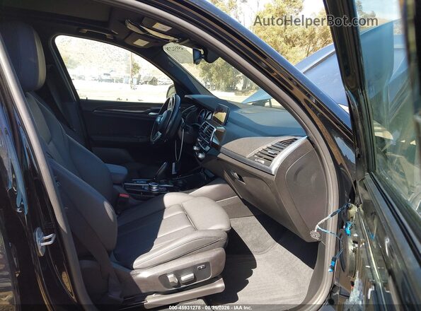 5UXTY3C00M9G13290 2021 BMW X3 Black Widok wnętrza z przodu