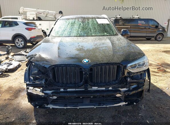 5UXTY3C00M9G13290 2021 BMW X3 Black Widok wnętrza z tyłu