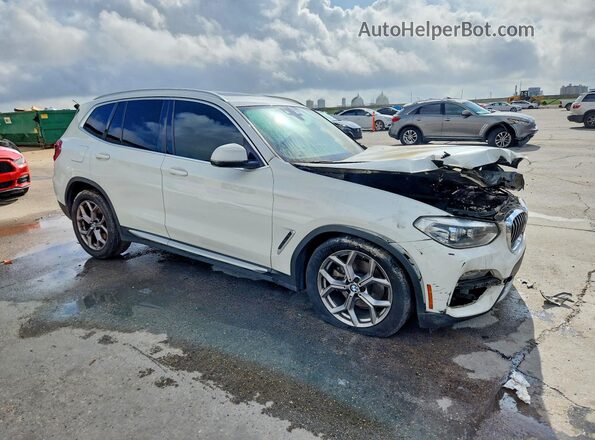 5UXTY3C03M9F57698 2021 BMW X3 White Front right