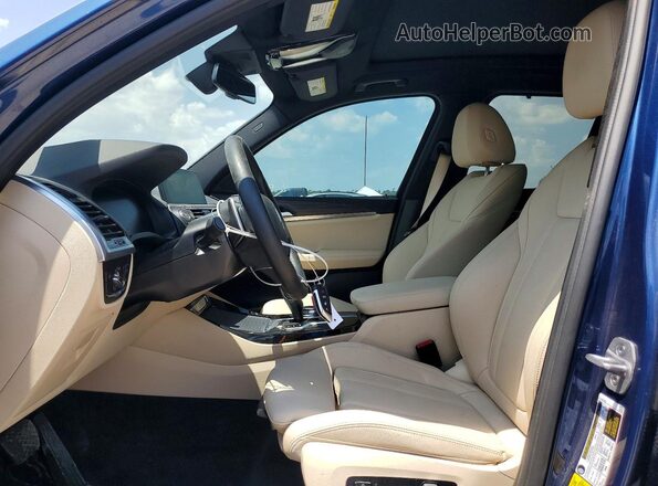 5UXTY3C03M9H85068 2021 BMW X3 Blue Vista interior delantera