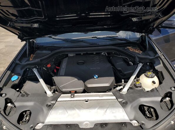 5UXTY3C04L9B17021 2020 BMW X3 Black Vista del compartimento del motor