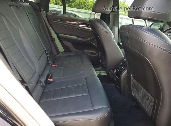 5UXTY3C04L9B17021 2020 BMW X3 Black Vista interior trasera