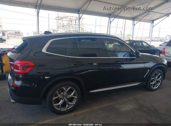 5UXTY3C08L9D40730 2020 BMW X3 Black Vista interior trasera