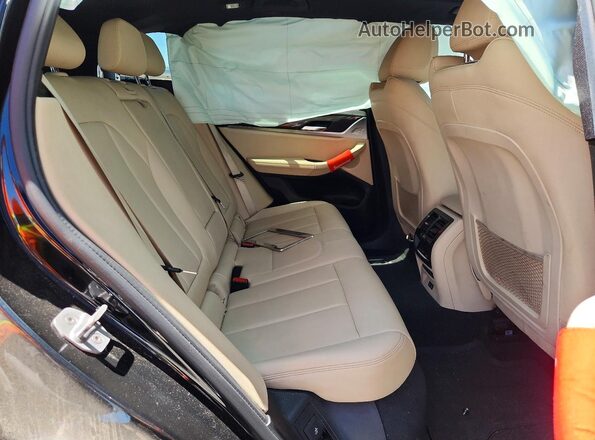 5UXTY3C09LLE55257 2020 BMW X3 Black Vista interior trasera