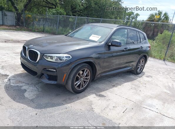 5UXTY3C0XM9H10013 2021 BMW X3 Black Առջևի ձախ երեք քառորդ տեսարան