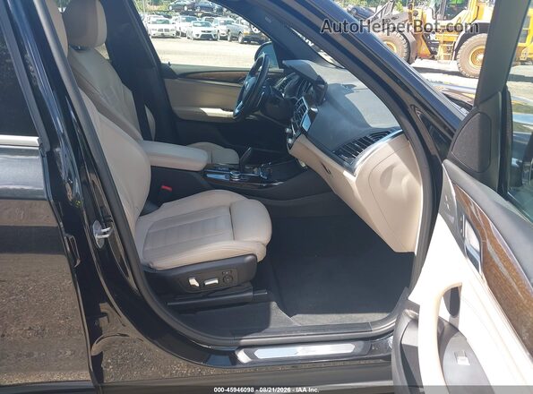 5UXTY5C01L9B65233 2020 BMW X3 Черный Вид салона спереди