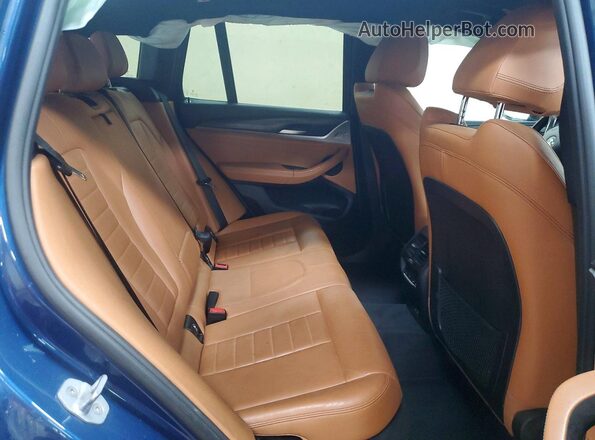 5UXTY5C01L9D50592 2020 BMW X3 Blue Rear interior view