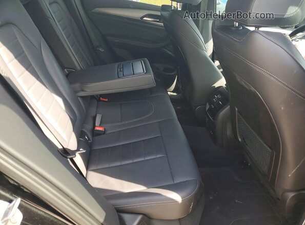 5UXTY5C02M9H06923 2021 BMW X3 Black Vista interior trasera