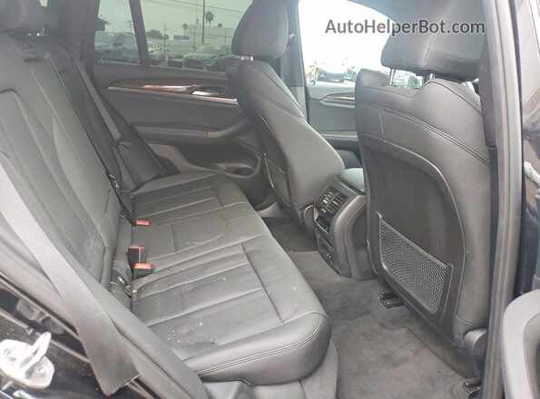 5UXTY5C02M9H65860 2021 BMW X3 Black Vista interior trasera