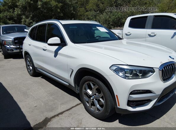 5UXTY5C06L9C63075 2020 BMW X3 White Вид задньої частини салону