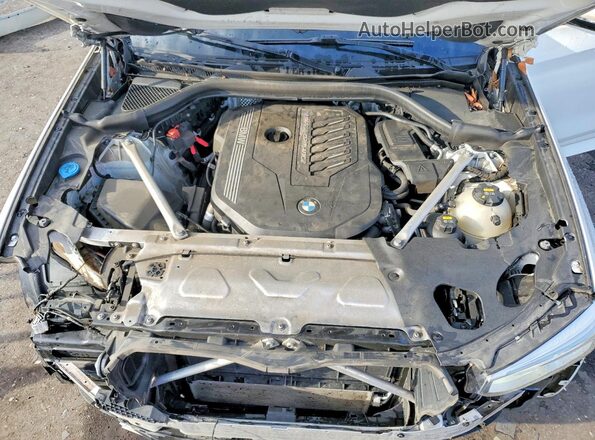 5UXTY9C03LLE60392 2020 BMW X3 White Vista del compartimento del motor