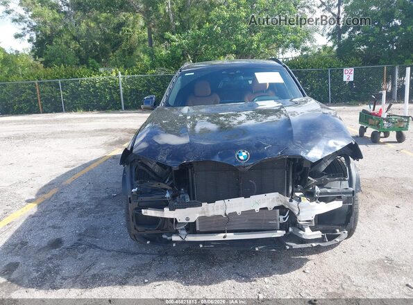 5UXTY9C03M9F80224 2021 BMW X3 Black Widok wnętrza z tyłu