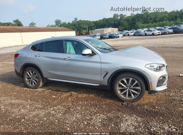 5UXUJ3C52KLG55626 2019 BMW X4 Silver Вид задньої частини салону