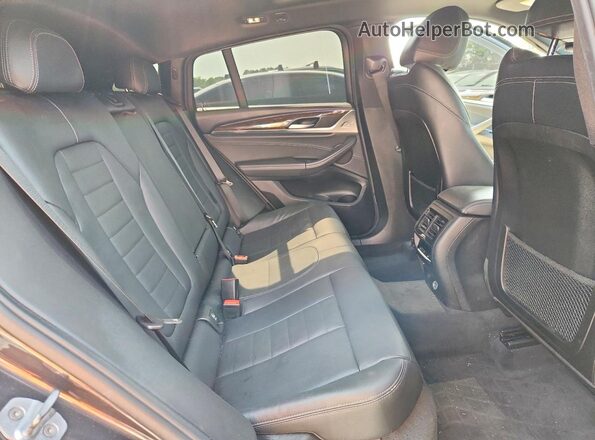 5UXUJ3C53KLA58761 2019 BMW X4 Charcoal Widok wnętrza z tyłu