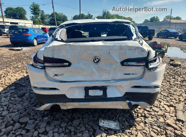 5UXUJ3C53KLG53660 2019 BMW X4 White Widok z tyłu
