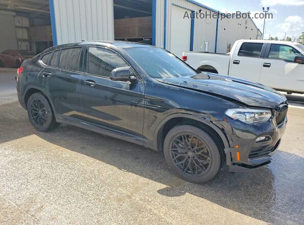 5UXUJ3C58KLG55744 2019 BMW X4 Черный Передняя правая четверть