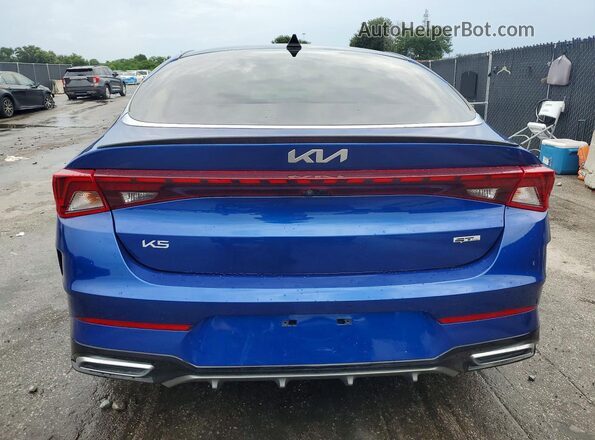 5XXG64J24RG235582 2024 KIA K5 Blue უკანა ხედი
