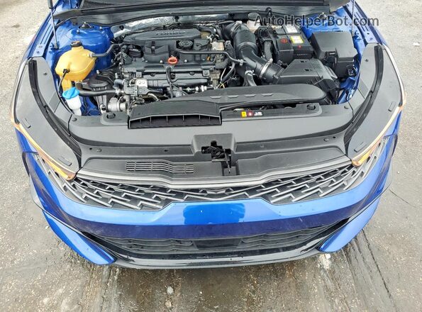 5XXG64J24RG235582 2024 KIA K5 Blue უკანა სალონის ხედი