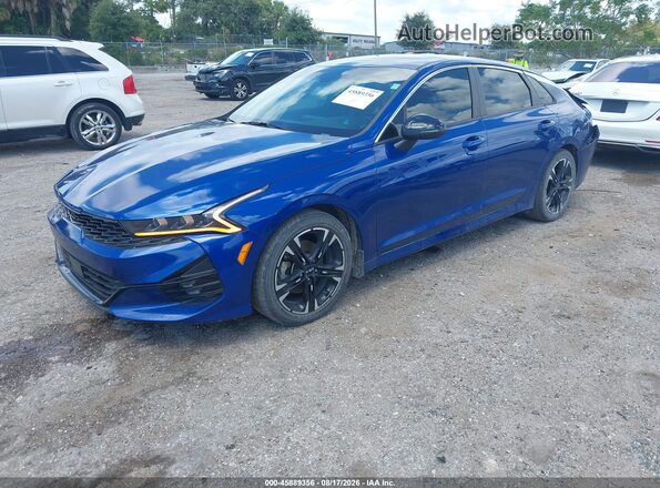 5XXG64J27PG167825 2023 KIA K5 Dark Blue Առջևի ձախ երեք քառորդ տեսարան