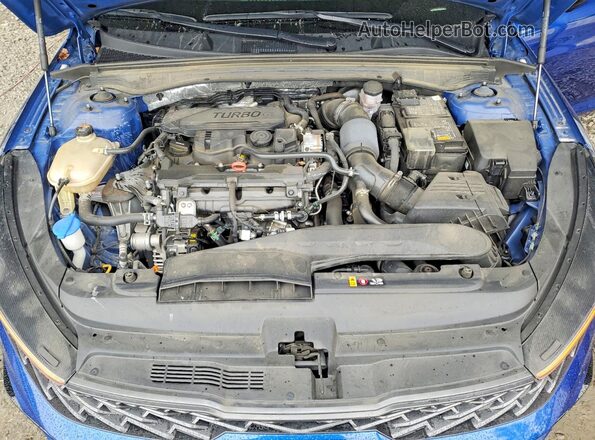 5XXG64J29RG244553 2024 KIA K5 Blue Սալոնի հետևի տեսք