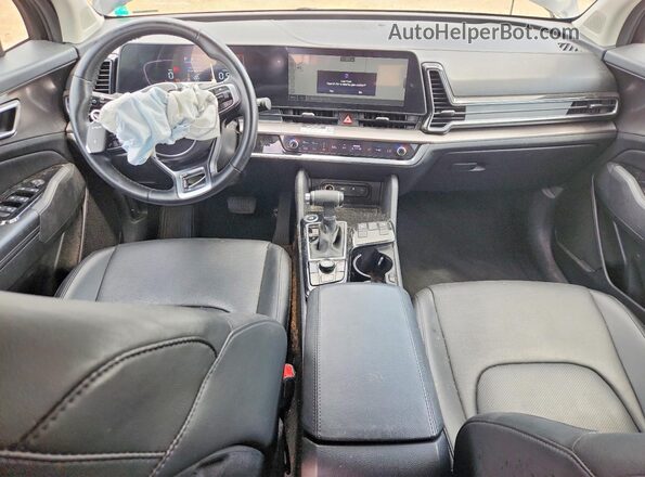5XYK33AF5PG097074 2023 KIA SPORTAGE Черный Вид панели приборов
