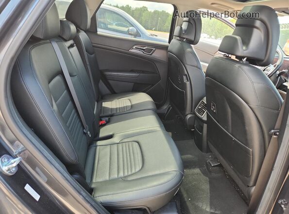 5XYK53AF1PG100479 2023 KIA SPORTAGE Gray Widok wnętrza z tyłu