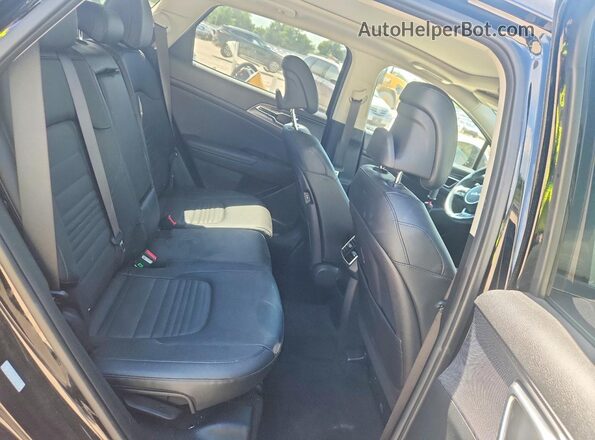 5XYK53AFXPG005807 2023 KIA SPORTAGE Black Widok wnętrza z tyłu