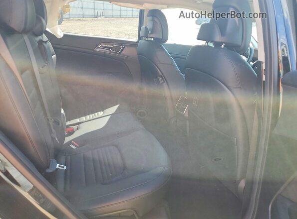 5XYK5CAF4PG089722 2023 KIA SPORTAGE Черный Вид задней части салона